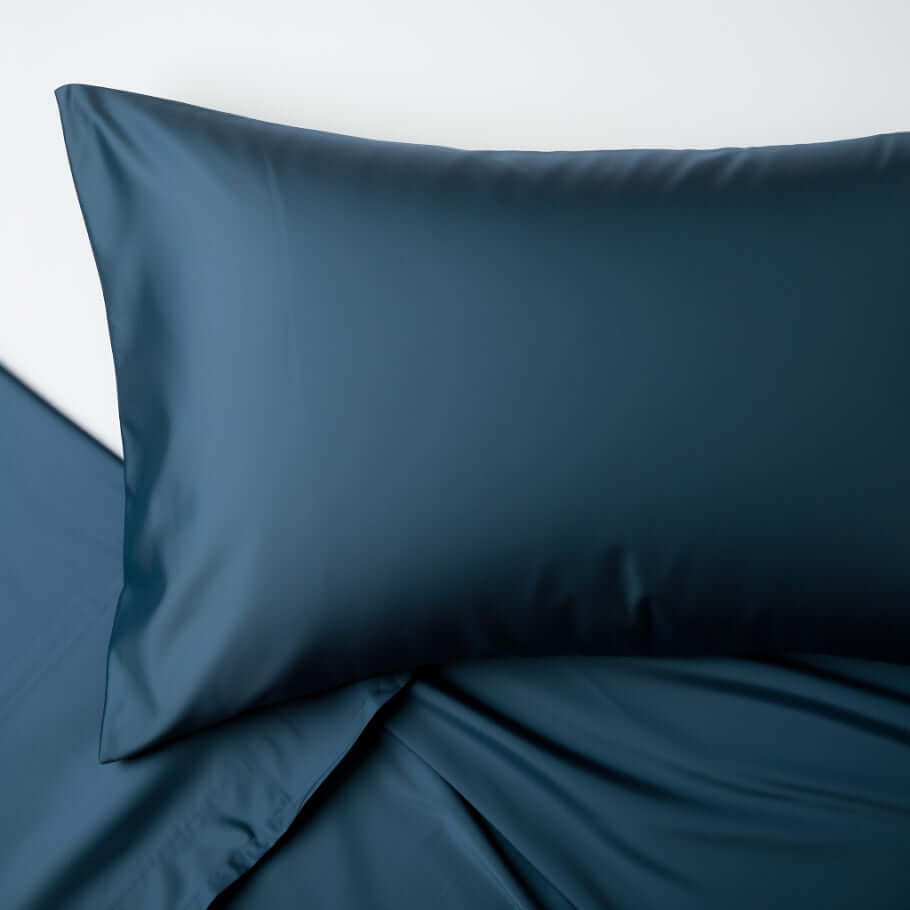 Premium 100% cotton pillowcase set in navy blue for a luxurious bedtime experience.