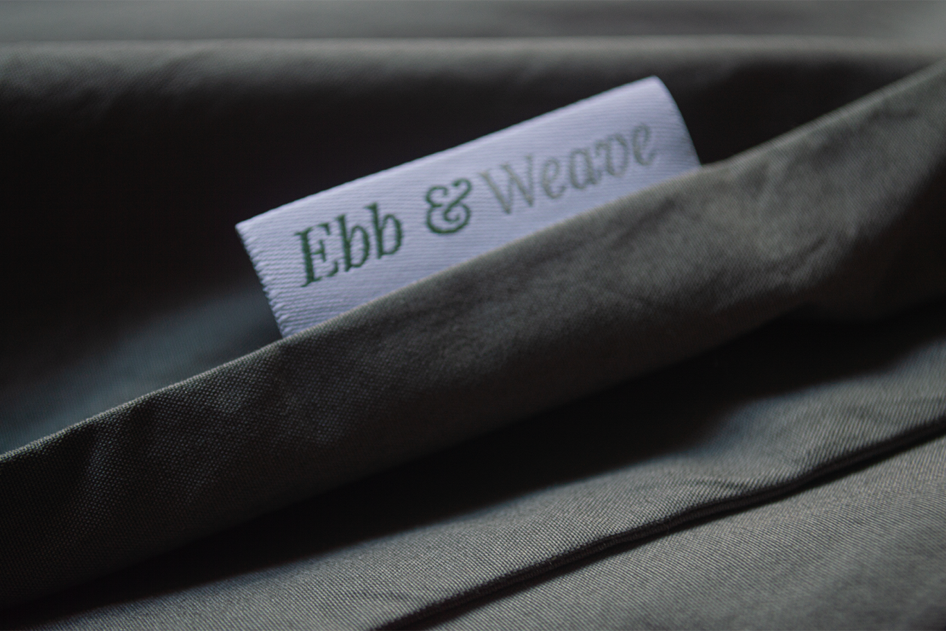 A close up of a label on a Grey Cotton Bedding Set by Ebb and Weave.